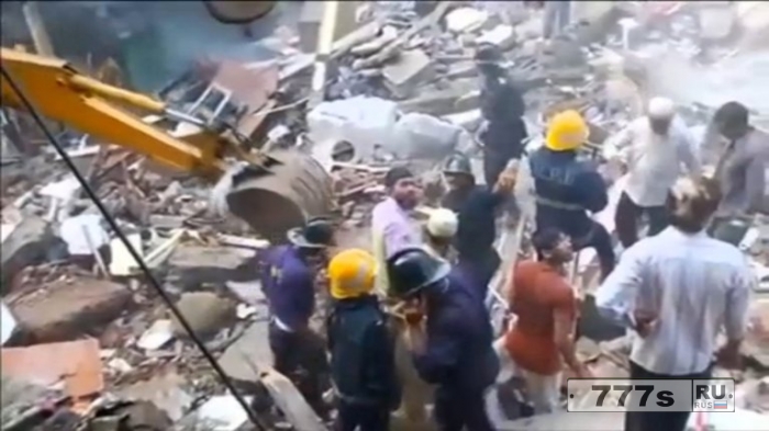 По меньшей мере девять погибших после разрушительного наводнения в Мумбаи.